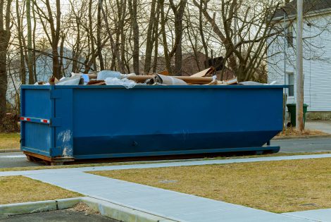 Full Bill over flowing Over flowing Dumpsters being full with garbage